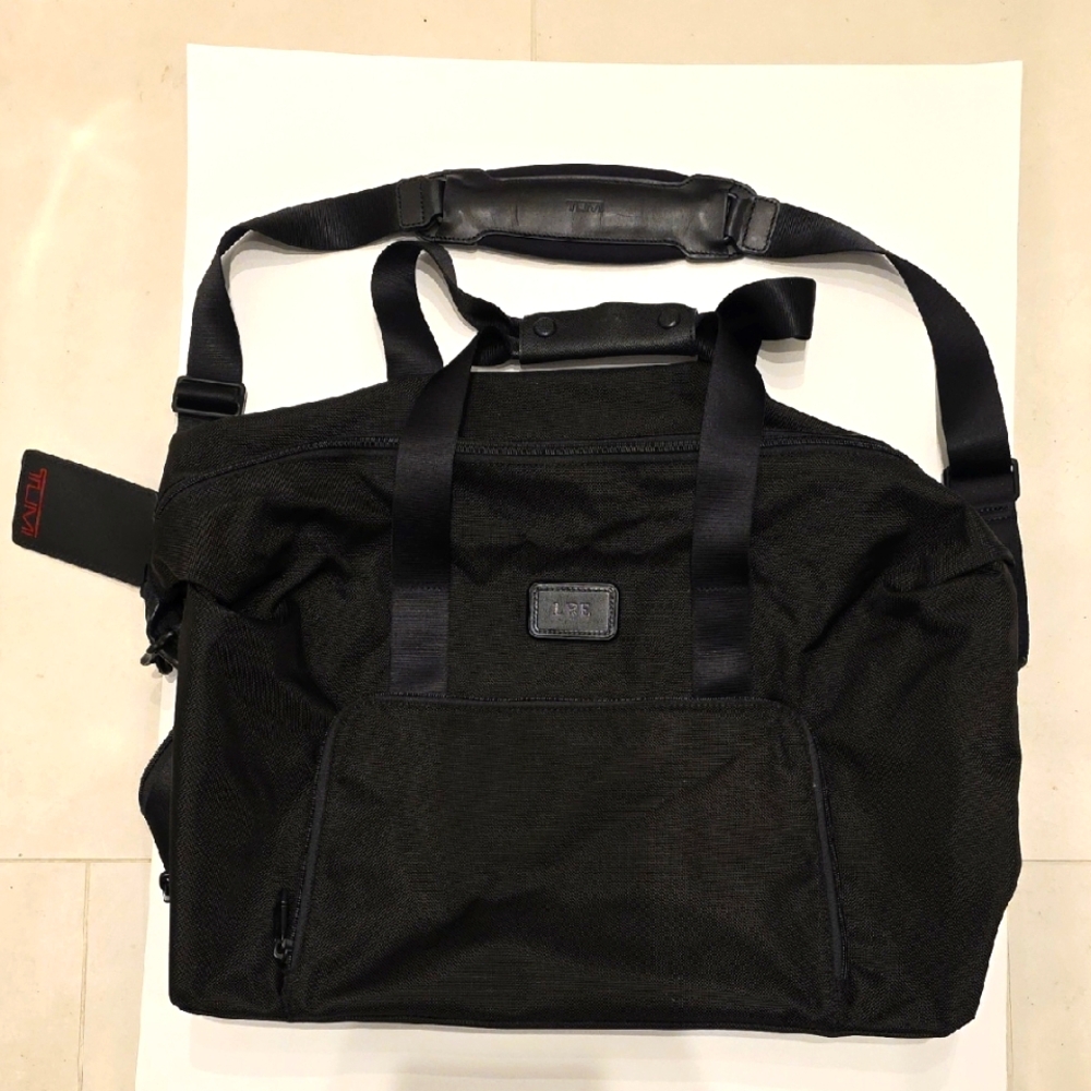 TUMI Ballistic Nylon Duffle In PRISTINE Condition. Expandable. Black. With Lock.